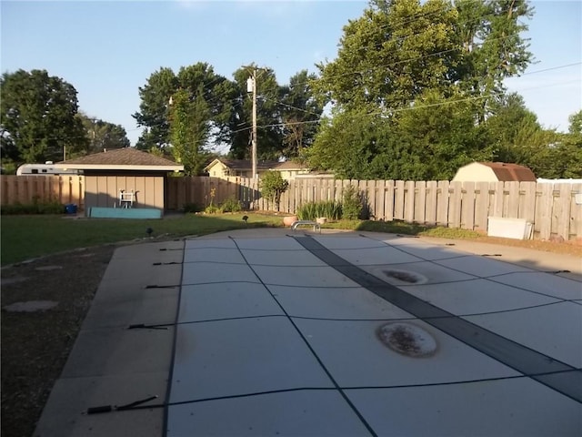 201 S Larson Ave, Chanute, KS 66720 - view of pool with a fenced backyard and a patio