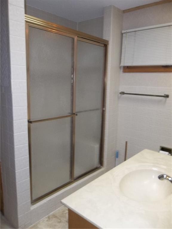 201 S Larson Ave, Chanute, KS 66720 - bathroom with a shower stall and vanity