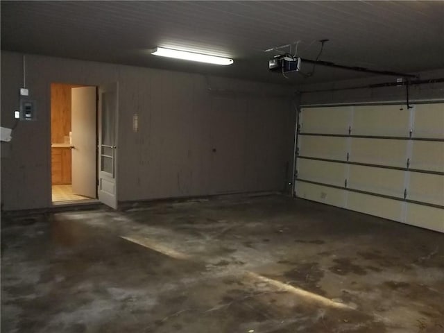 201 S Larson Ave, Chanute, KS 66720 - garage featuring a garage door opener