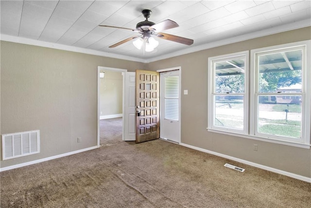 2514 Belmont Ave, Parsons, KS 67357 - spare room with carpet flooring, a ceiling fan, and ornamental molding