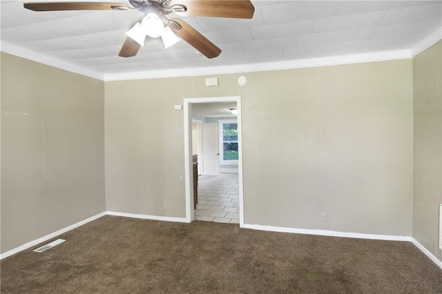 2514 Belmont Ave, Parsons, KS 67357 - spare room with carpet flooring, ornamental molding, and ceiling fan