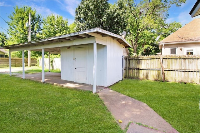 2514 Belmont Ave, Parsons, KS 67357 - view of shed featuring a fenced backyard