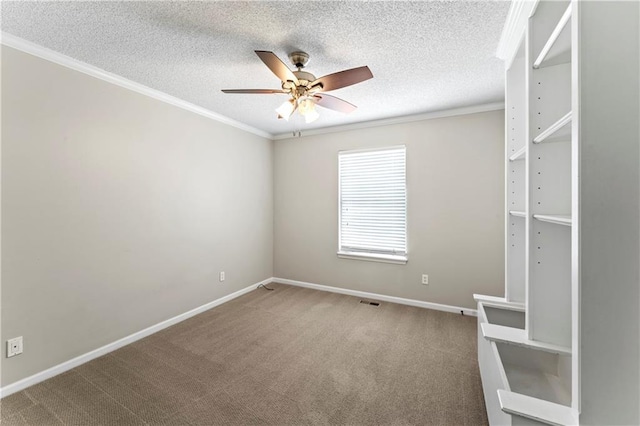 1103 N 2nd St E, Louisburg, KS 66053 - carpeted spare room featuring a ceiling fan, crown molding, and a textured ceiling
