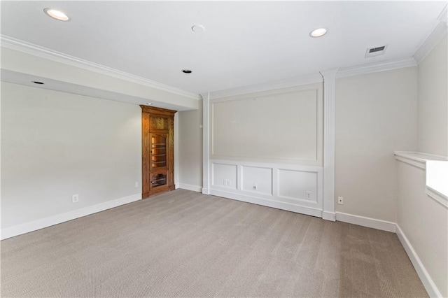 1103 N 2nd St E, Louisburg, KS 66053 - empty room with ornamental molding, light carpet, and recessed lighting