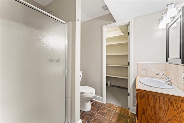 1103 N 2nd St E, Louisburg, KS 66053 - full bath featuring a stall shower, vanity, tile patterned flooring, a spacious closet, and tasteful backsplash