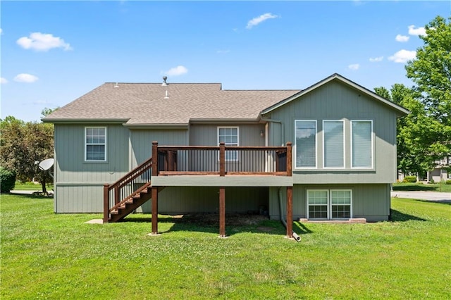 1103 N 2nd St E, Louisburg, KS 66053 - rear view of house featuring a deck, roof with shingles, a yard, and stairway