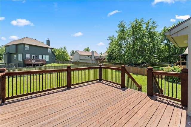 1103 N 2nd St E, Louisburg, KS 66053 - wooden terrace featuring a fenced backyard
