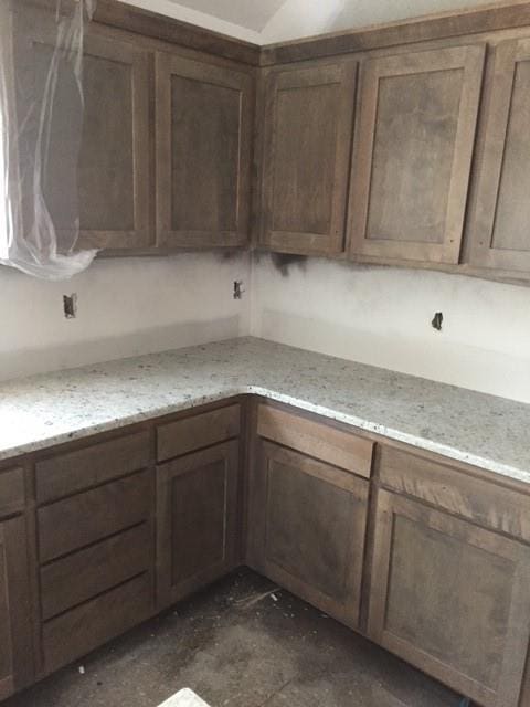 3812 SW Mcdanial Ave, Blue Springs, MO 64015 - kitchen featuring light stone countertops