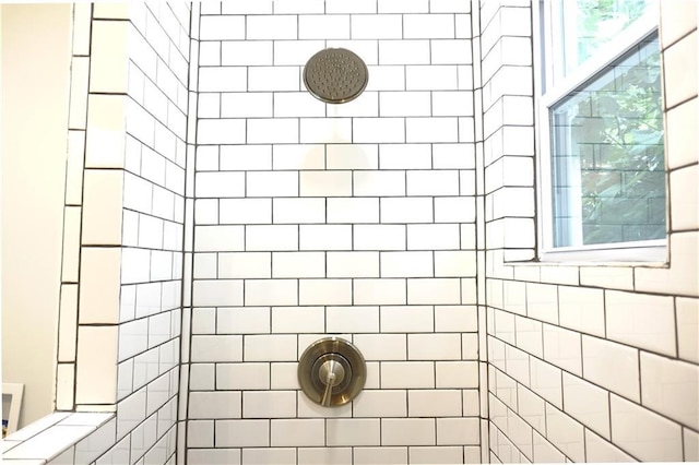 5032 E 8th St, Kansas City, MO 64124 - full bathroom featuring tiled shower and healthy amount of natural light