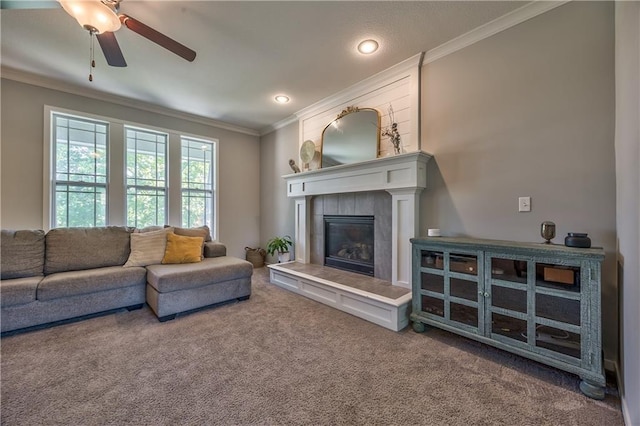 23317 W 52nd Ter, Shawnee, KS 66226 - living area featuring carpet flooring, crown molding, a ceiling fan, a fireplace, and recessed lighting