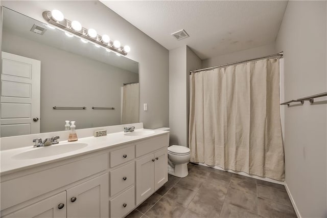 23317 W 52nd Ter, Shawnee, KS 66226 - bathroom with double vanity, a textured ceiling, curtained shower, and tile patterned floors