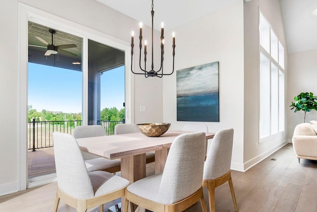 16567 W 170th St, Olathe, KS 66062 - dining space with light wood finished floors, a chandelier, and ceiling fan