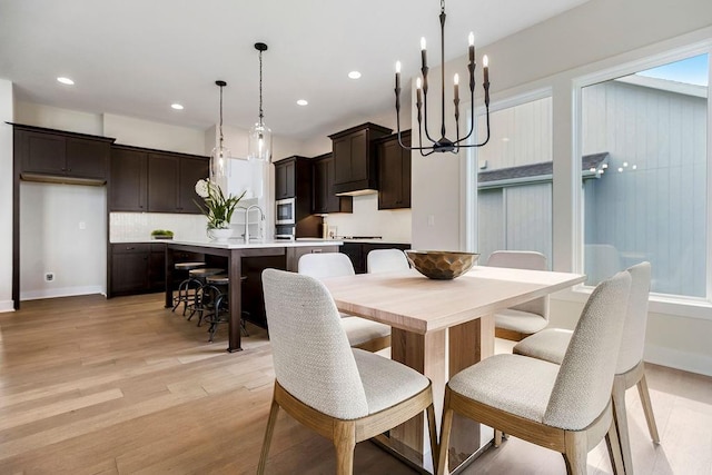 16567 W 170th St, Olathe, KS 66062 - dining room featuring a chandelier, light wood-style flooring, and recessed lighting