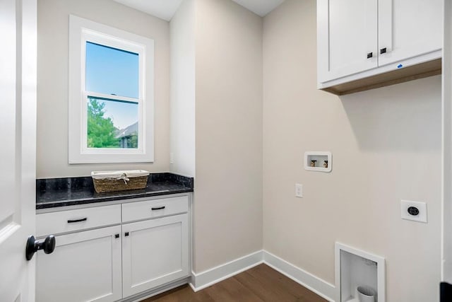 16567 W 170th St, Olathe, KS 66062 - washroom with electric dryer hookup, dark wood-style flooring, cabinet space, and hookup for a washing machine