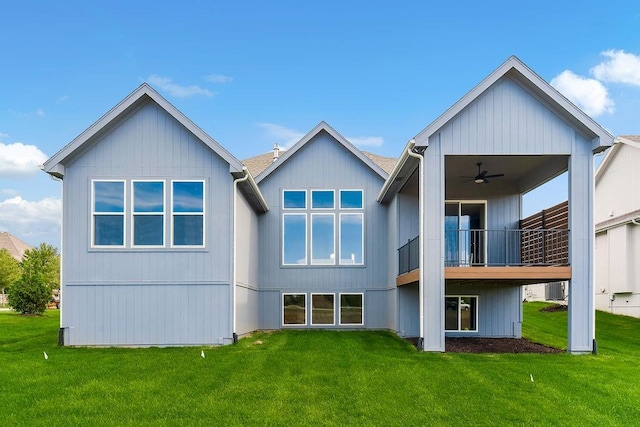 16567 W 170th St, Olathe, KS 66062 - rear view of house with a ceiling fan, a yard, and a balcony