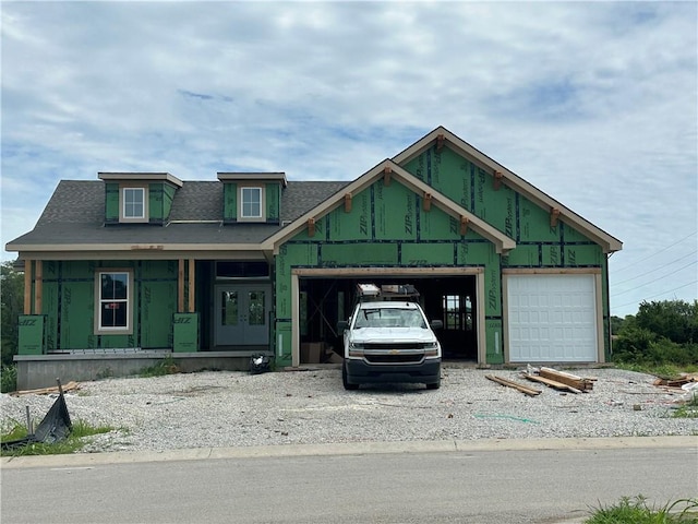 2014 SW Farm Field Ln, Lees Summit, MO 64082 - property in mid-construction featuring an attached garage, driveway, and roof with shingles