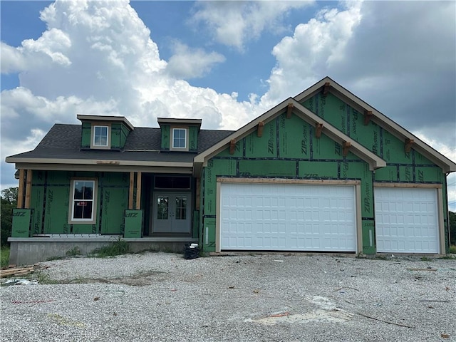 2014 SW Farm Field Ln, Lees Summit, MO 64082 - unfinished property with driveway, a garage, and a porch
