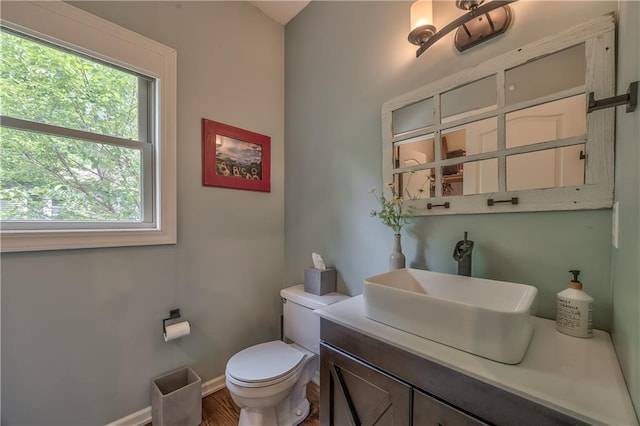 11508 Hauser St, Overland Park, KS 66210 - half bathroom featuring toilet and vanity