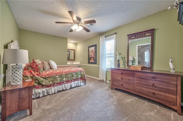 11508 Hauser St, Overland Park, KS 66210 - bedroom featuring carpet, a textured ceiling, and ceiling fan