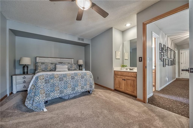 11508 Hauser St, Overland Park, KS 66210 - carpeted bedroom featuring a textured ceiling, a ceiling fan, and ensuite bath