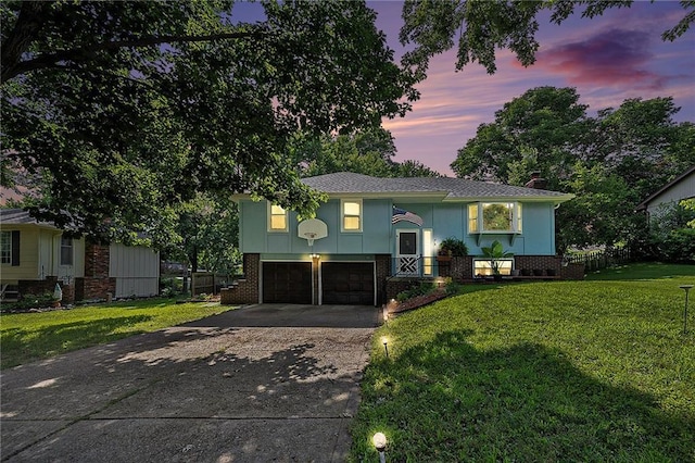 7608 N Serene Ave, Kansas City, MO 64152 - bi-level home with driveway, a garage, brick siding, and a chimney