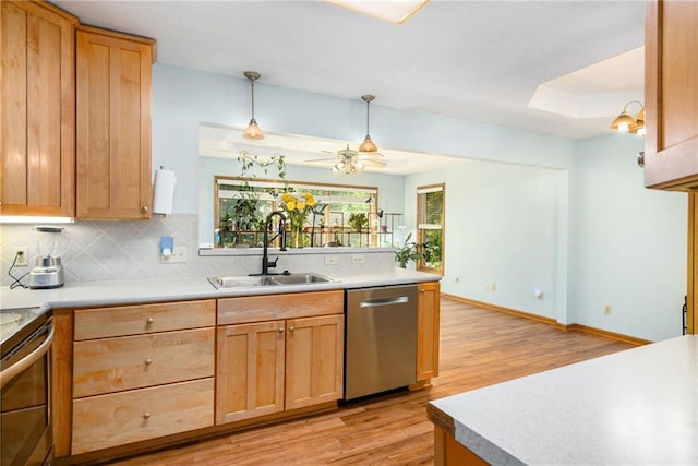 7608 N Serene Ave, Kansas City, MO 64152 - kitchen with appliances with stainless steel finishes, light wood-style floors, tasteful backsplash, and light countertops