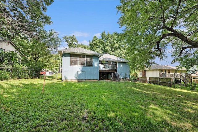 7608 N Serene Ave, Kansas City, MO 64152 - rear view of house with a deck and stairway