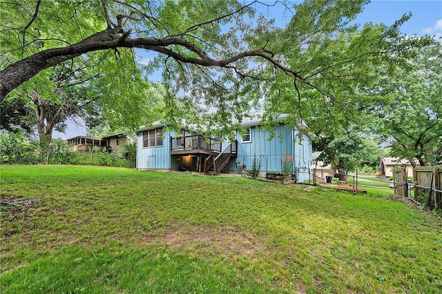 7608 N Serene Ave, Kansas City, MO 64152 - view of yard with stairs and a deck