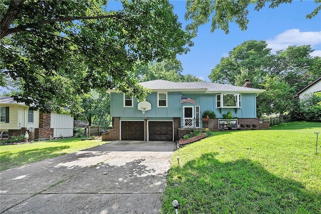 7608 N Serene Ave, Kansas City, MO 64152 - split foyer home featuring concrete driveway, an attached garage, a chimney, and brick siding