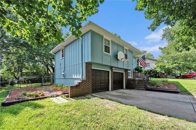7608 N Serene Ave, Kansas City, MO 64152 - view of side of property with board and batten siding, an attached garage, brick siding, driveway, and stairway