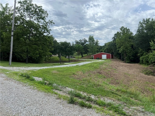 36987 W 63rd St, Camden, MO 64017 - view of dirt / gravel road with a pole building