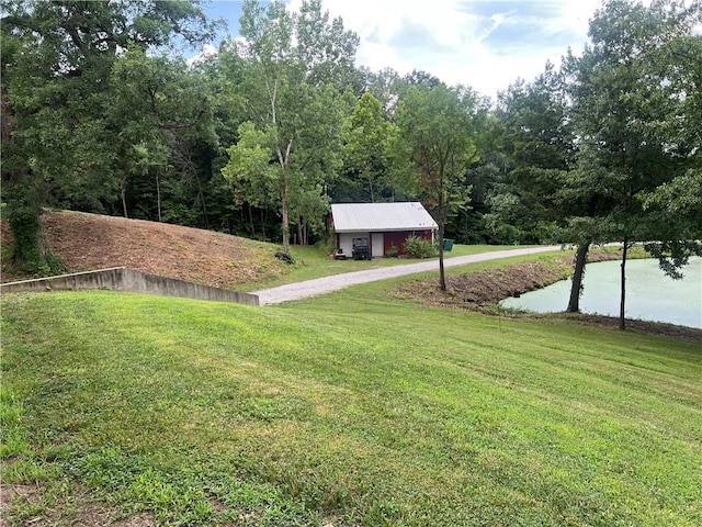 36987 W 63rd St, Camden, MO 64017 - view of green lawn with a water view