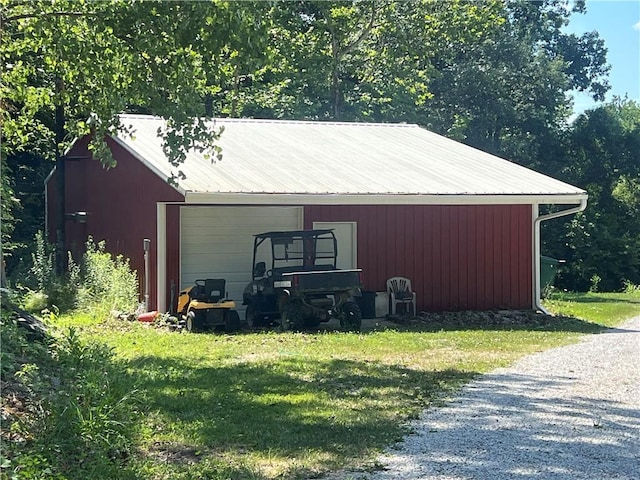 36987 W 63rd St, Camden, MO 64017 - view of pole building featuring a lawn and gravel driveway