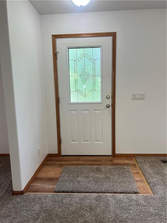 36987 W 63rd St, Camden, MO 64017 - entryway featuring baseboards and carpet floors