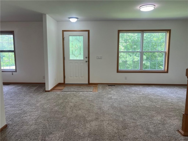 36987 W 63rd St, Camden, MO 64017 - foyer featuring carpet and baseboards