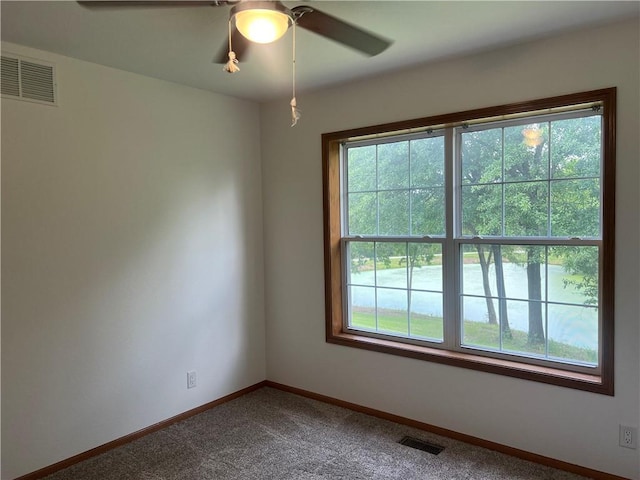 36987 W 63rd St, Camden, MO 64017 - unfurnished room with plenty of natural light, carpet flooring, and ceiling fan