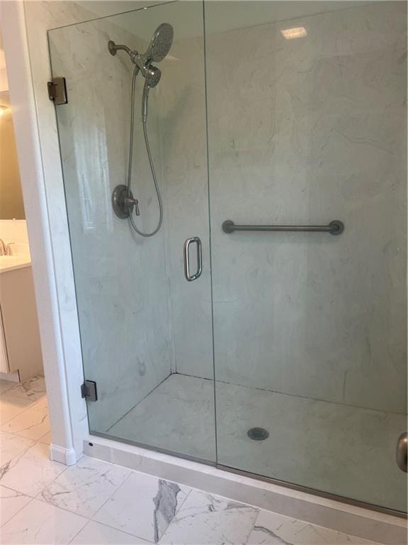36987 W 63rd St, Camden, MO 64017 - full bathroom with marble look tiles, a stall shower, and vanity