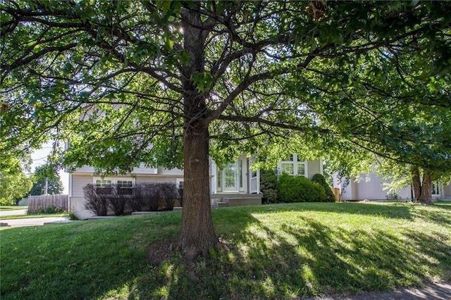 5323 Kenton St, Shawnee, KS 66226 - obstructed view of property with a front lawn