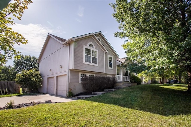 5323 Kenton St, Shawnee, KS 66226 - view of front of home featuring concrete driveway and a garage
