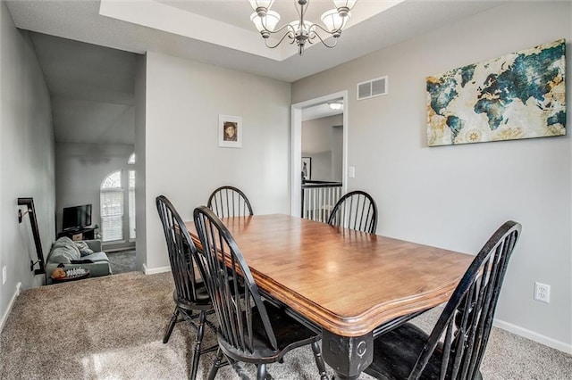5323 Kenton St, Shawnee, KS 66226 - dining area featuring carpet floors and a chandelier