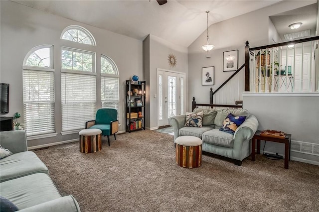 5323 Kenton St, Shawnee, KS 66226 - carpeted living room with stairway, high vaulted ceiling, and ceiling fan