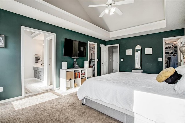 5323 Kenton St, Shawnee, KS 66226 - bedroom with lofted ceiling, a walk in closet, carpet floors, ensuite bath, and arched walkways