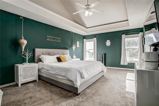 5323 Kenton St, Shawnee, KS 66226 - bedroom featuring carpet, vaulted ceiling, a tray ceiling, and a ceiling fan