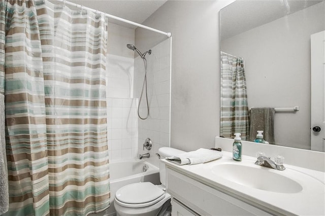 5323 Kenton St, Shawnee, KS 66226 - bathroom featuring vanity, shower / tub combo with curtain, and a textured ceiling