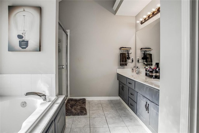 5323 Kenton St, Shawnee, KS 66226 - bathroom with double vanity, a bath, a shower stall, and tile patterned flooring