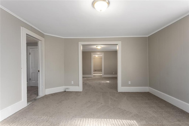 816 Chestnut St, Osawatomie, KS 66064 - unfurnished room featuring carpet flooring and crown molding