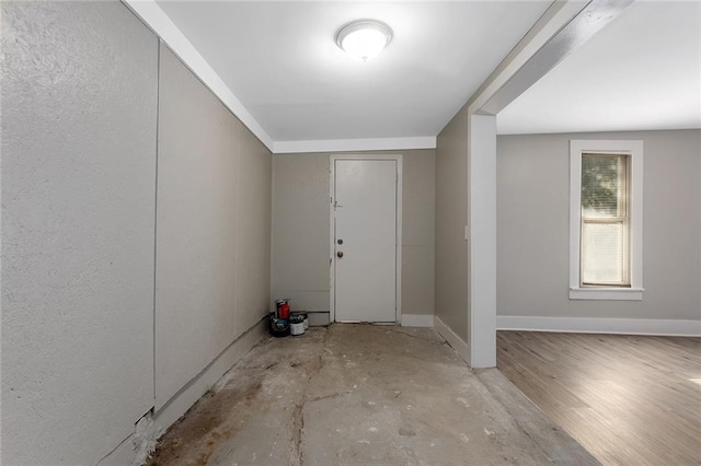 816 Chestnut St, Osawatomie, KS 66064 - foyer entrance with baseboards and concrete floors