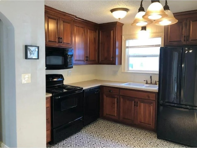 8007 Mercier St, Kansas City, MO 64114 - kitchen with black appliances, arched walkways, and light countertops