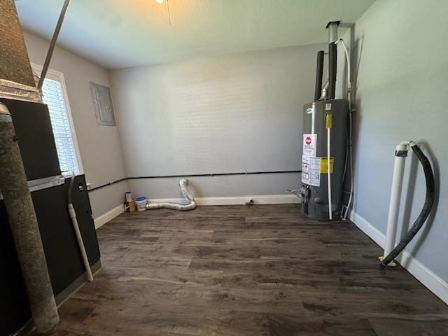 477 Shawnee Rd, Kansas City, KS 66103 - utility room with water heater