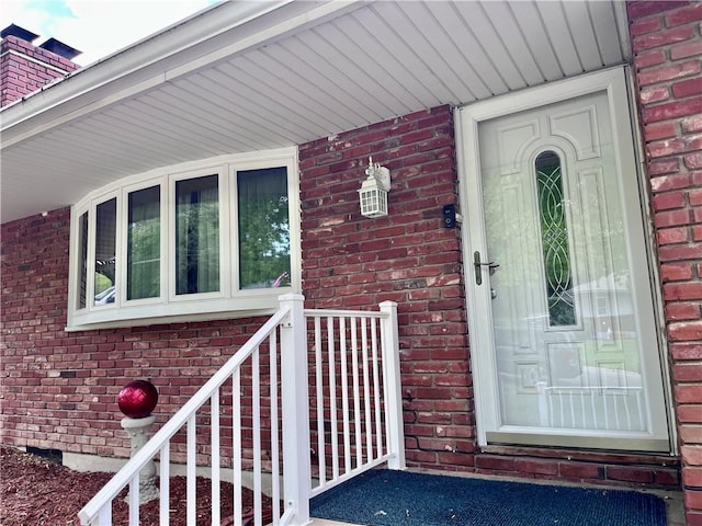 11510 Ridge Dr, Sugar Creek, MO 64054 - property entrance featuring brick siding and crawl space